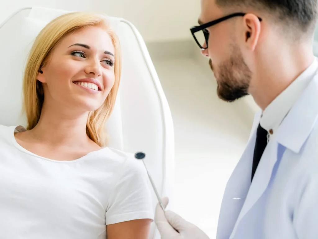 Woman smiling during dental consultation dr murphy dentist