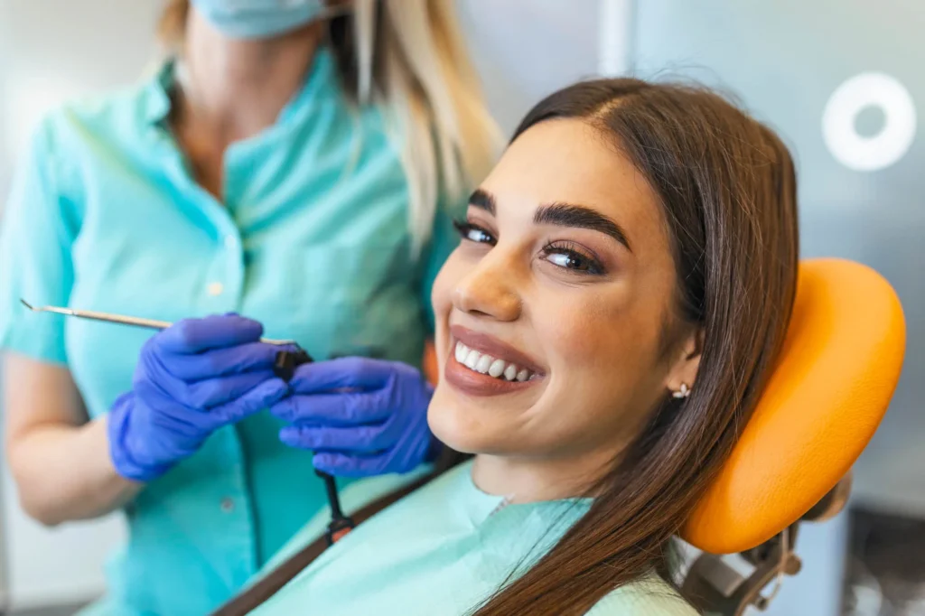 Patient-smiling-during-an-upper-east-side-dentist-visit