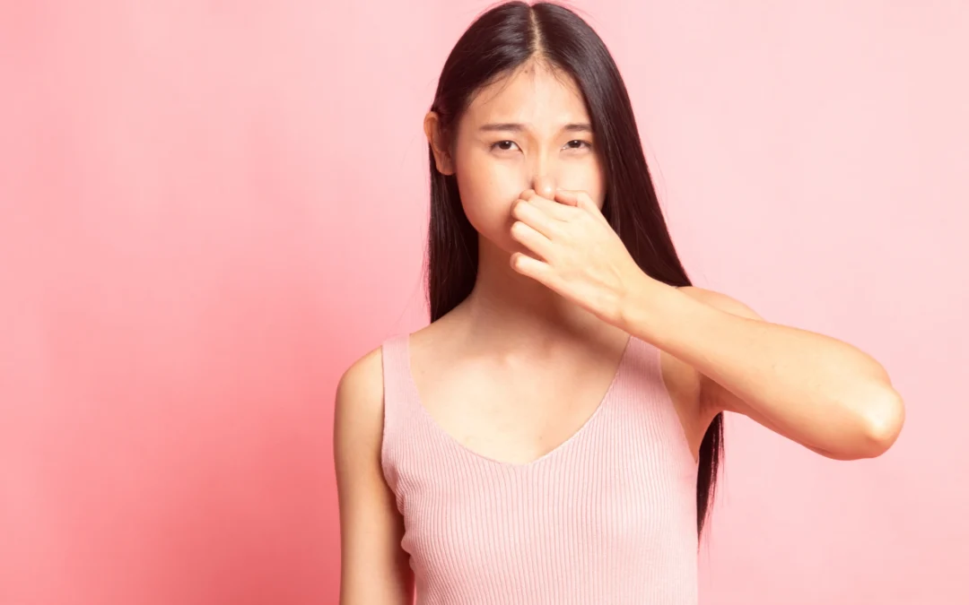 woman with bad breath before going to the dentist in Upper East Side, NYC